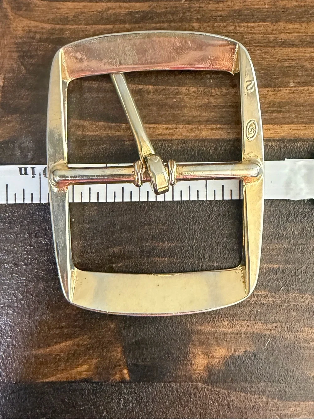 Lot of 6 Assorted Metal Belt Buckles with Leather Accent. One is Solid Brass.